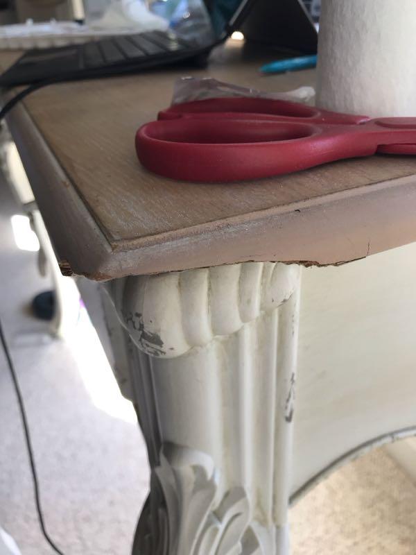 Close-up of damaged desk corner